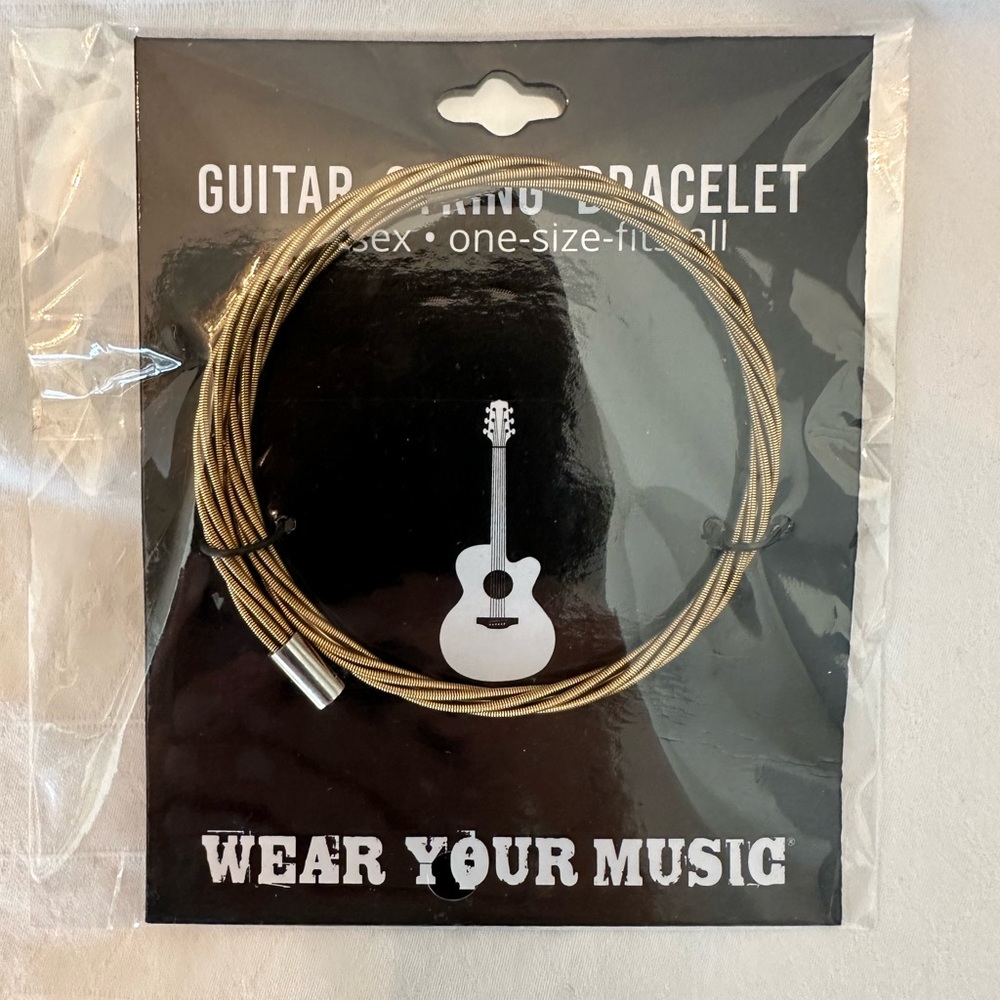 Guitar string bracelet, unisex, one size fits all, brass and silver tone.